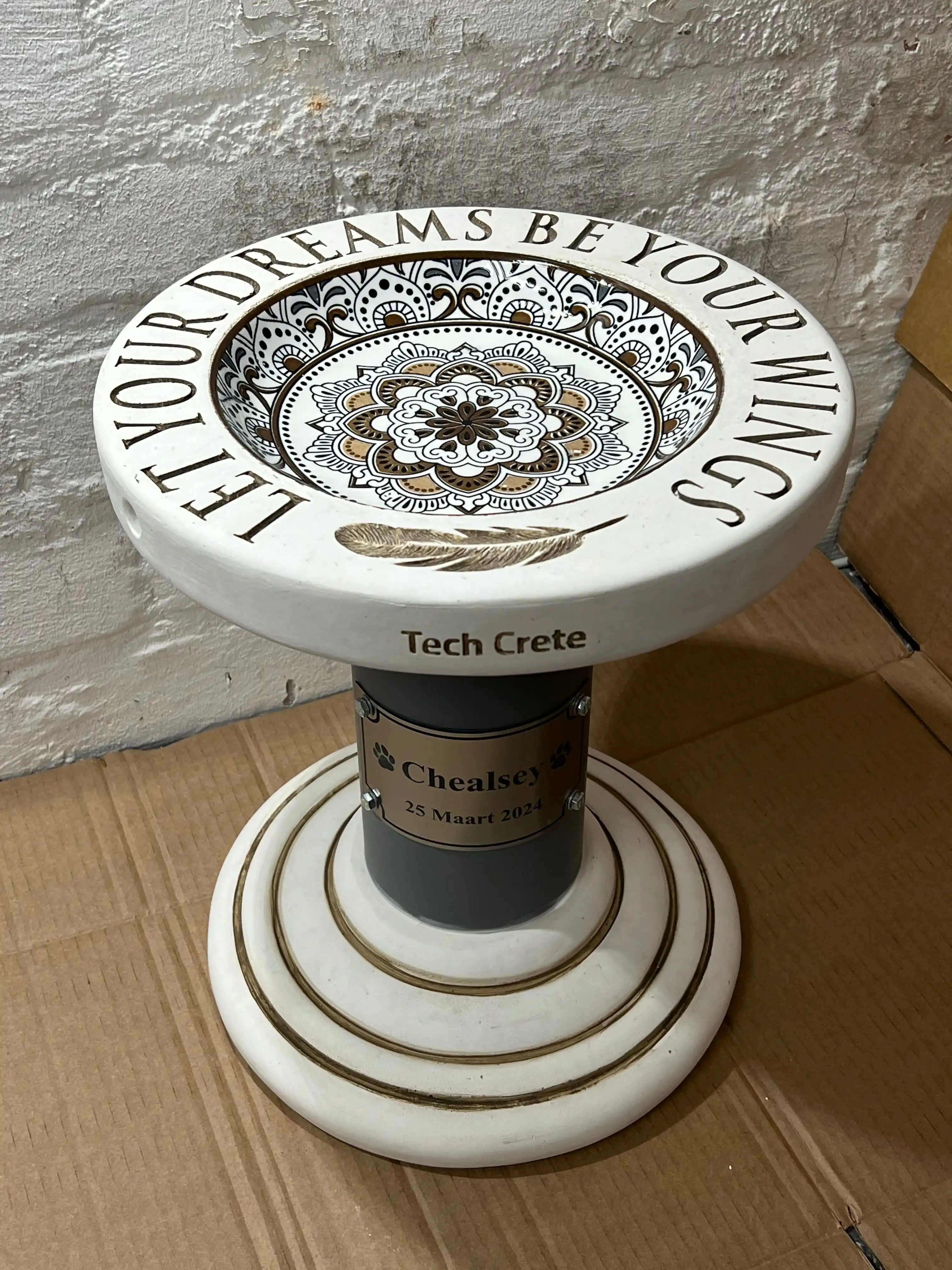 Memorial concrete birdbath that holds ashes or keepsakes